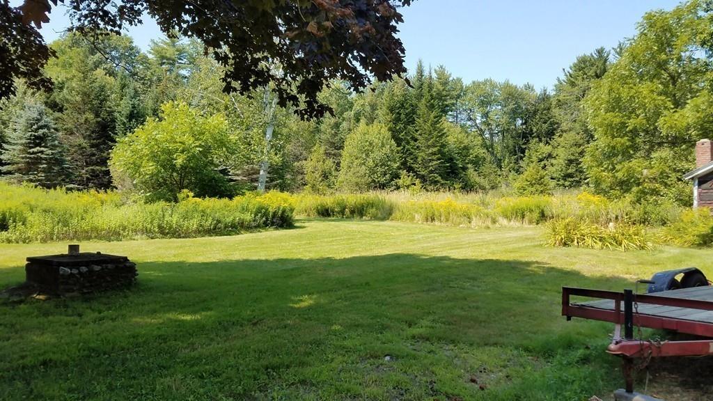 63 Gardner Road Hubbardston, MA 01452 - Photo 35 of 42 a garden view with a seating space