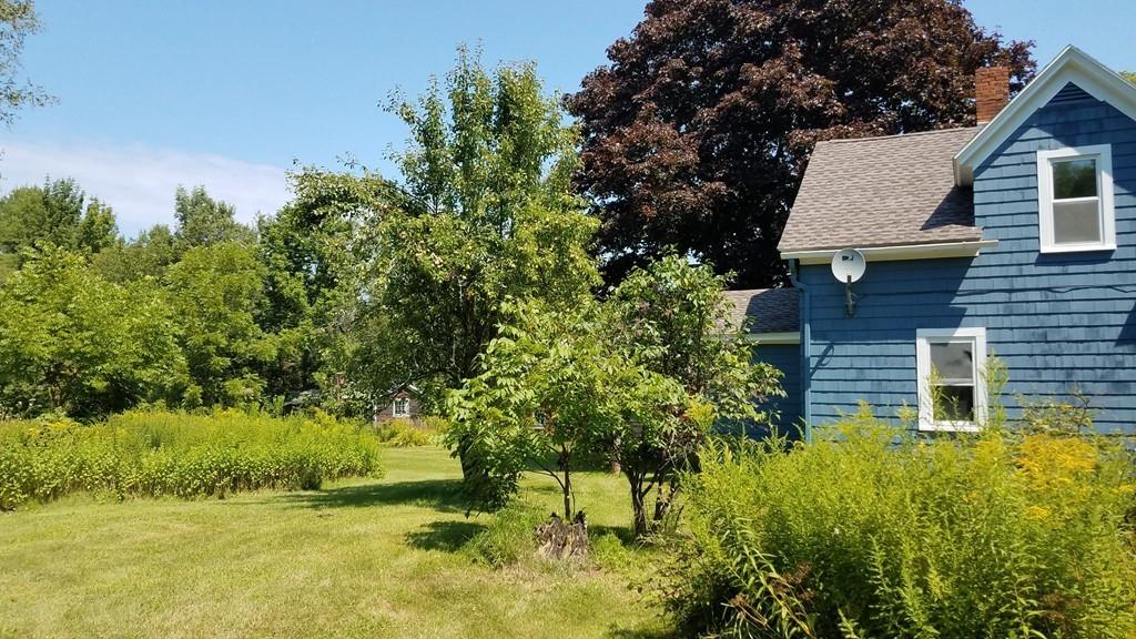 63 Gardner Road Hubbardston, MA 01452 - Photo 4 of 42 a view of house with backyard
