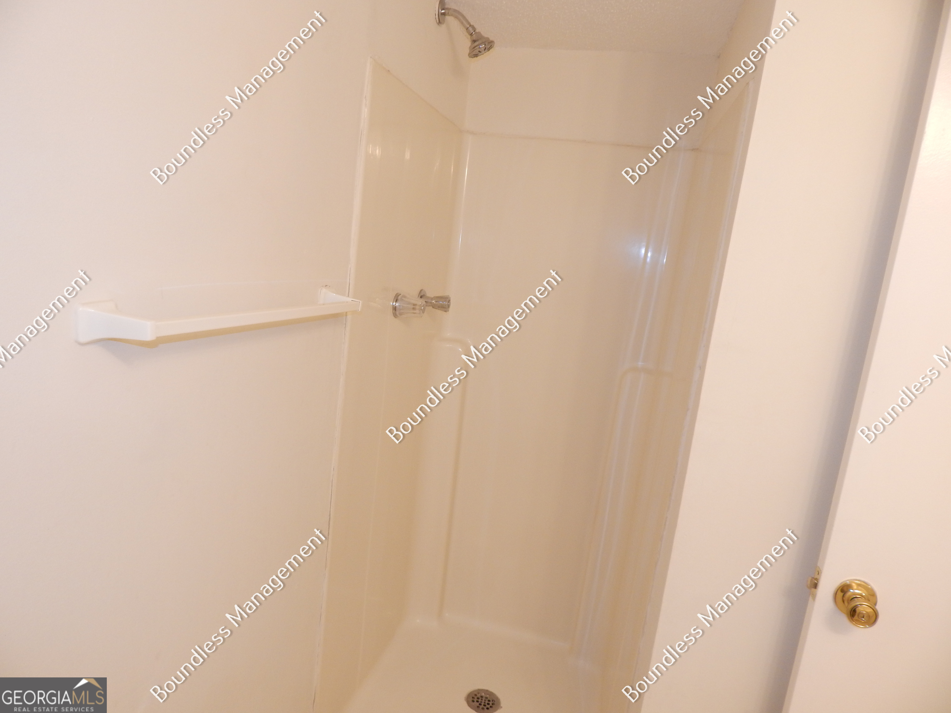 3627 Forrest Park Road Southeast, Unit 25 Atlanta, GA 30354 - Photo 13 of 13 a bathroom with a shower