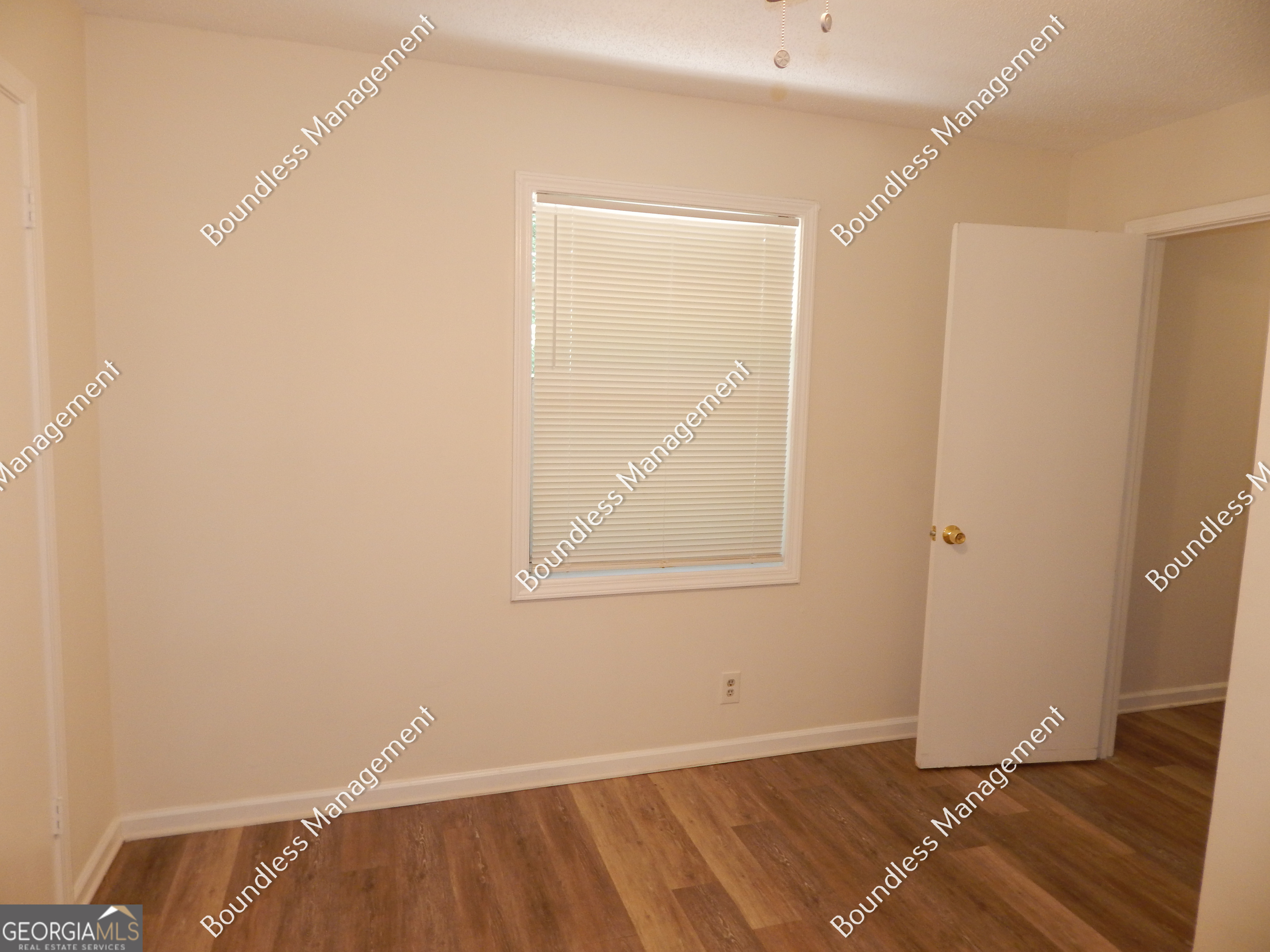 3627 Forrest Park Road Southeast, Unit 25 Atlanta, GA 30354 - Photo 9 of 13 an empty room with a window