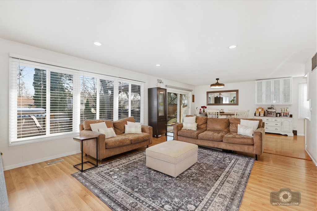 113 Lexington Drive Bolingbrook, IL 60440 - Photo 2 of 10 a living room with furniture and a large window