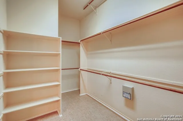 a view of an empty walk in closet