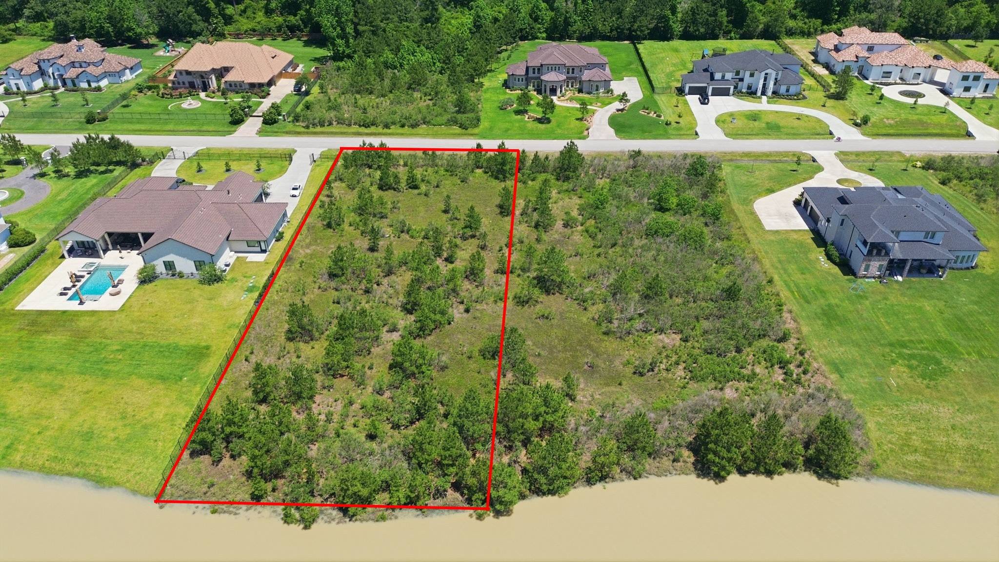 27539 South Lazy Meadow Way Spring, TX 77386 - Photo 2 of 31 1 Acre lot is Prestigious Benders Landing!