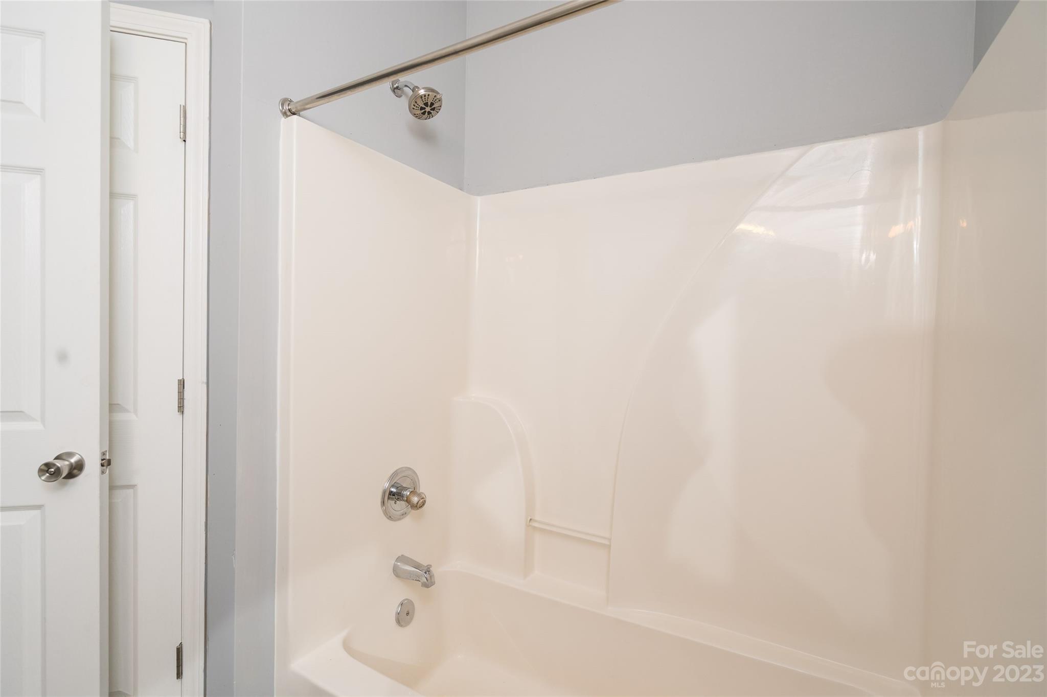 5908 Britt Lane Dallas, NC 28034 - Photo 13 of 22 a bathroom with a shower and a bathtub