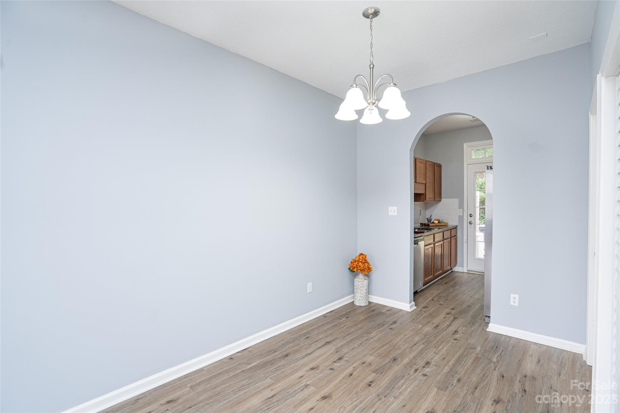 5908 Britt Lane Dallas, NC 28034 - Photo 5 of 22 a view of a room with wooden floor chandelier and entryway