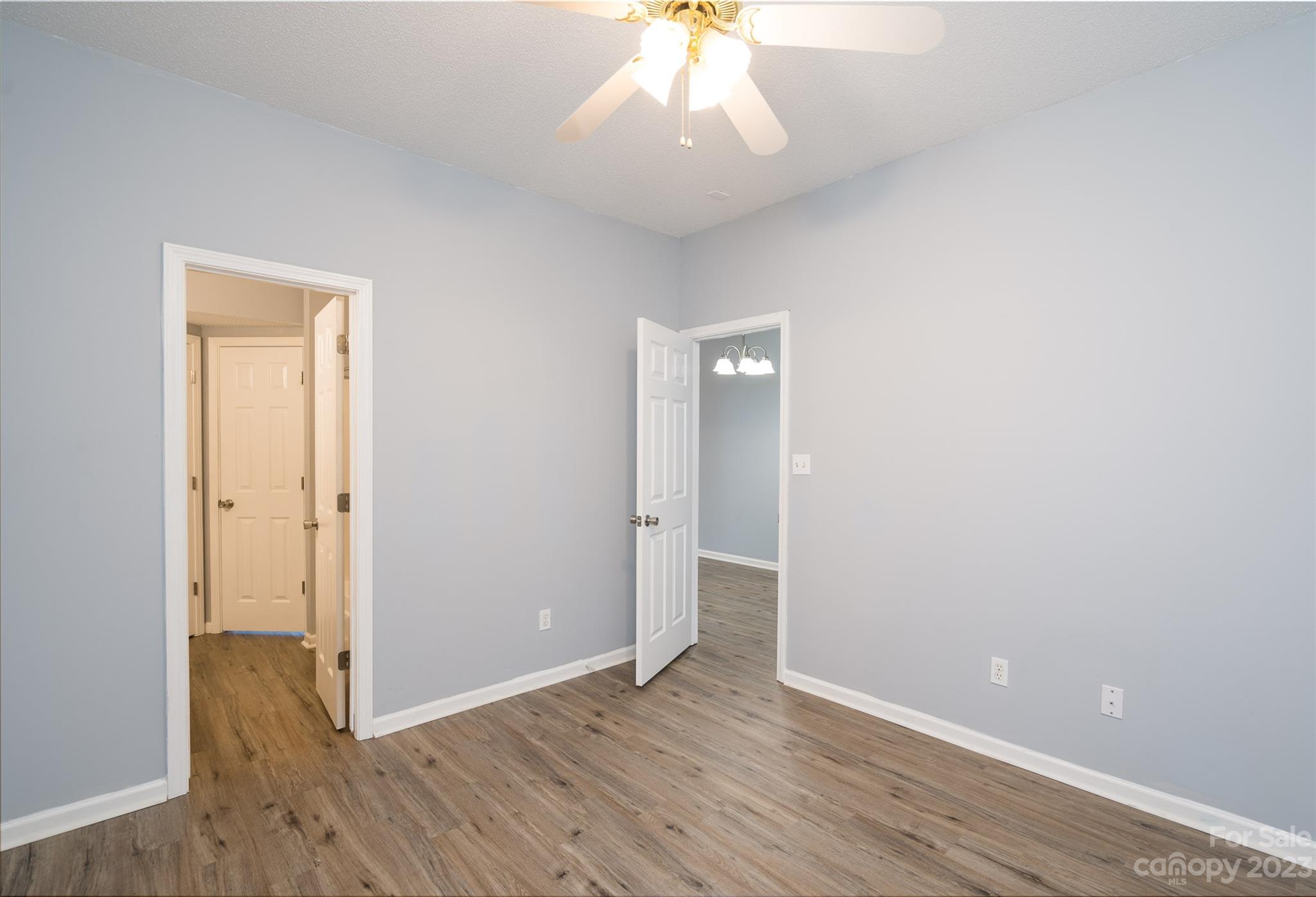 5908 Britt Lane Dallas, NC 28034 - Photo 10 of 22 an empty room with wooden floor and closet