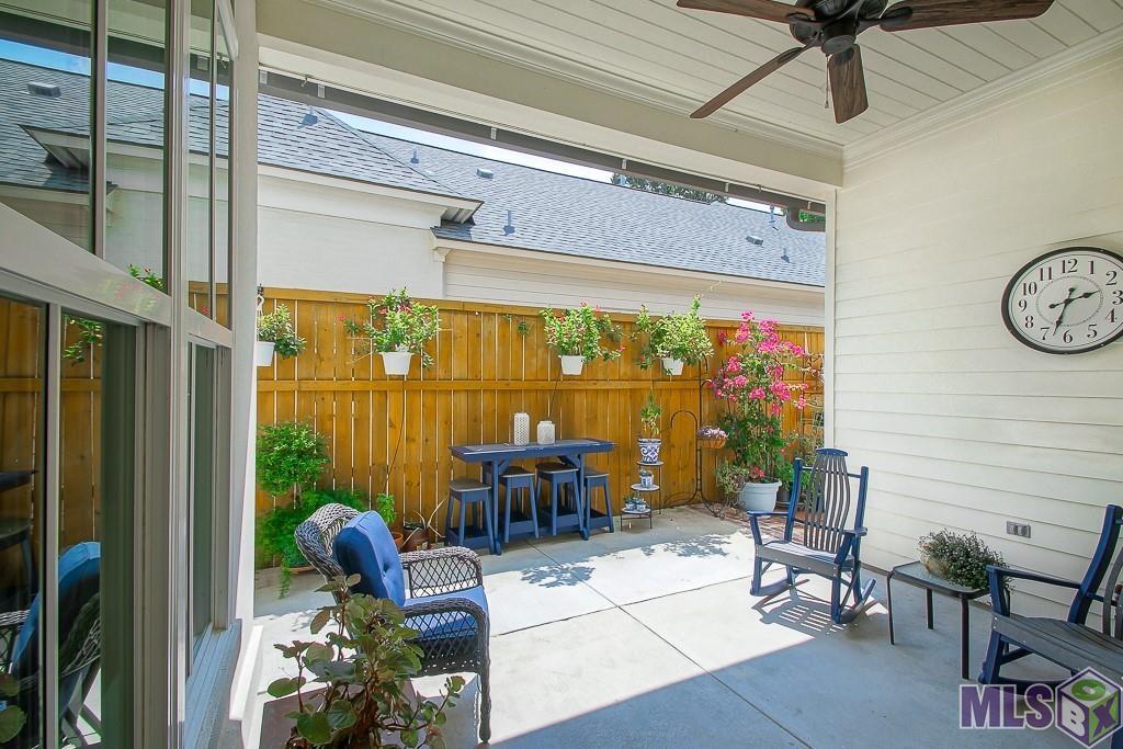 3921 Craftsman Lane Baton Rouge, LA 70809 - Photo 24 of 29 Side Courtyard and Covered Patio Area
