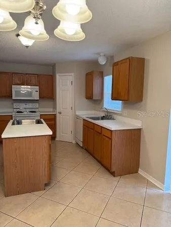 a kitchen with a cabinets and counter space