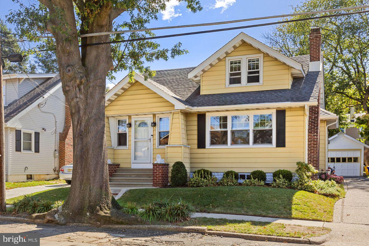 204 Princeton Road Audubon, NJ 08106 - Photo 1 of 22 a front view of a house with garden