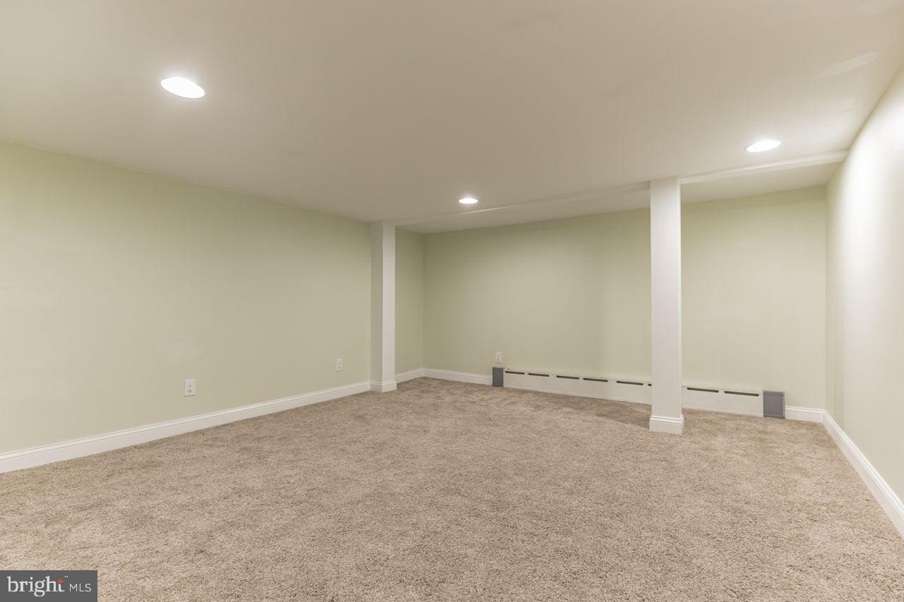 204 Princeton Road Audubon, NJ 08106 - Photo 17 of 22 an empty room with a ceiling fan