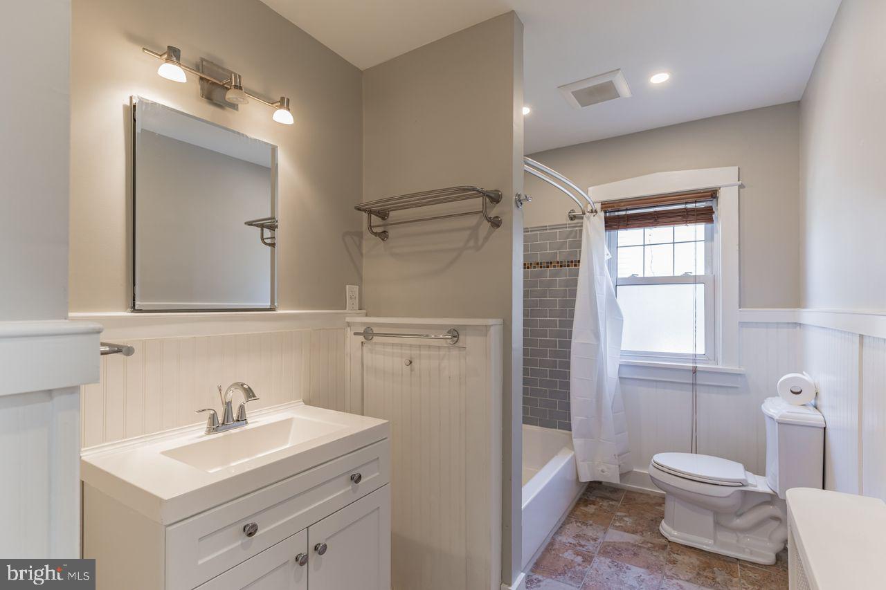 204 Princeton Road Audubon, NJ 08106 - Photo 10 of 22 a bathroom with a sink toilet vanity and shower