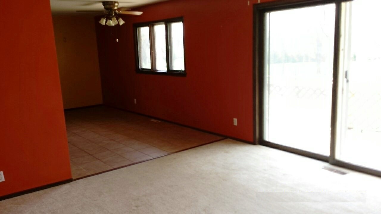 6952 Cemetery Road Rockford, IL 61101 - Photo 7 of 20 a view of an empty room with a window