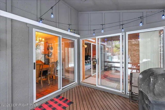 a view of a hallway with front door
