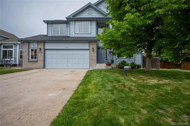 a view of house with outdoor space and porch