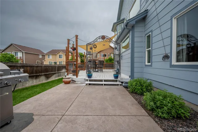a view of a balcony with furniture