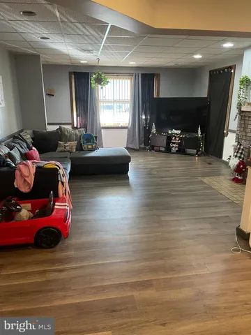 a living room with furniture window and a table