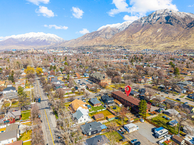460 200 South Provo, UT 84606 - Photo 59 of 66 Aerial perspective of suburban area with mountains