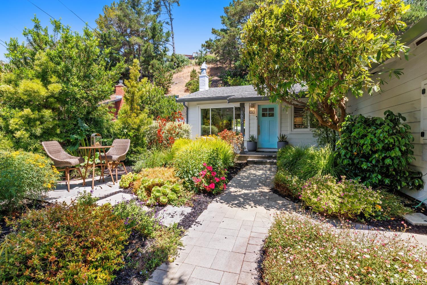 1615 Linda Mar Boulevard Pacifica, CA 94044 - Photo 1 of 41 a front view of a house with a yard