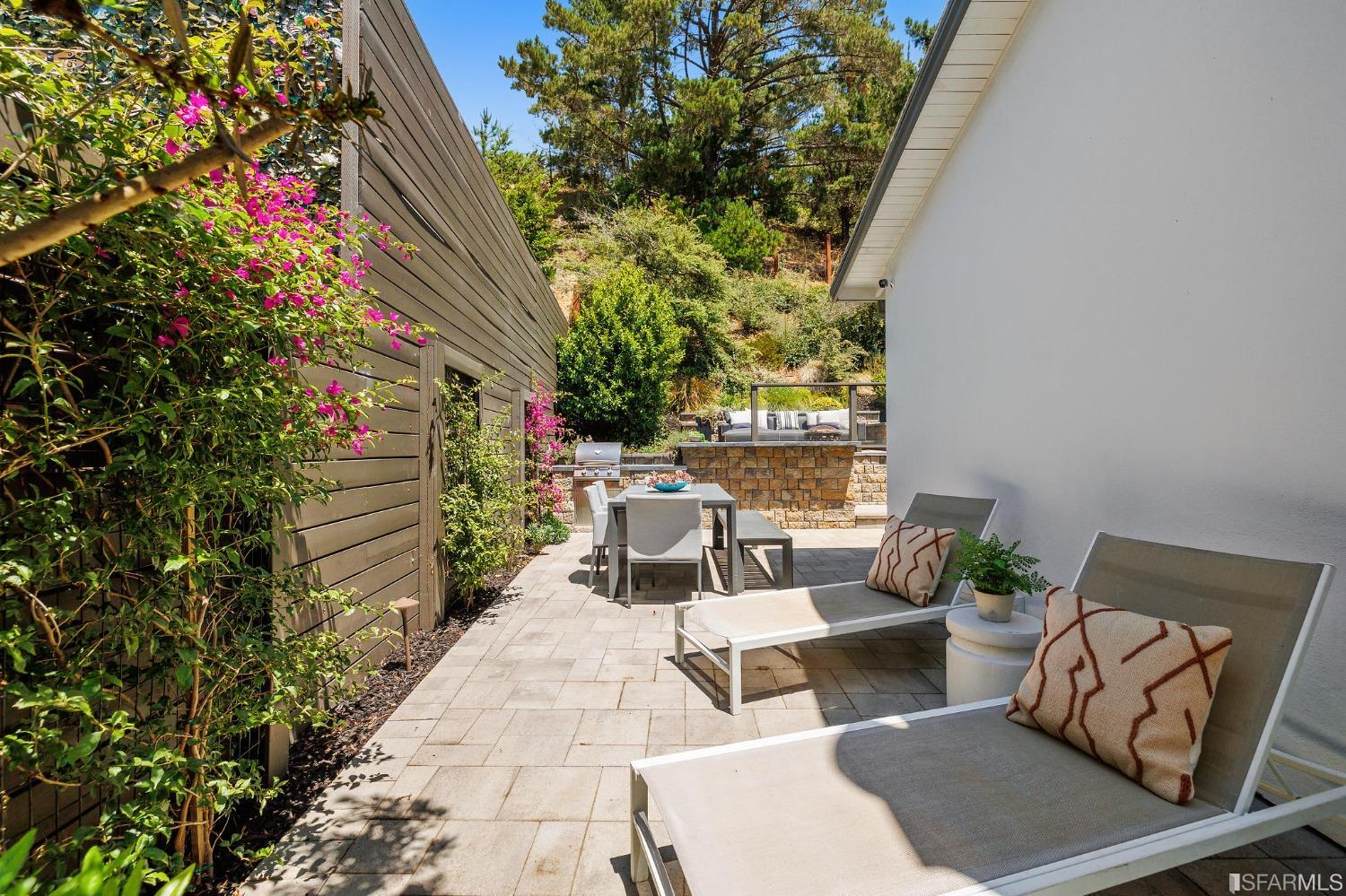 1615 Linda Mar Boulevard Pacifica, CA 94044 - Photo 16 of 41 a view of a patio with table and chairs and potted plants