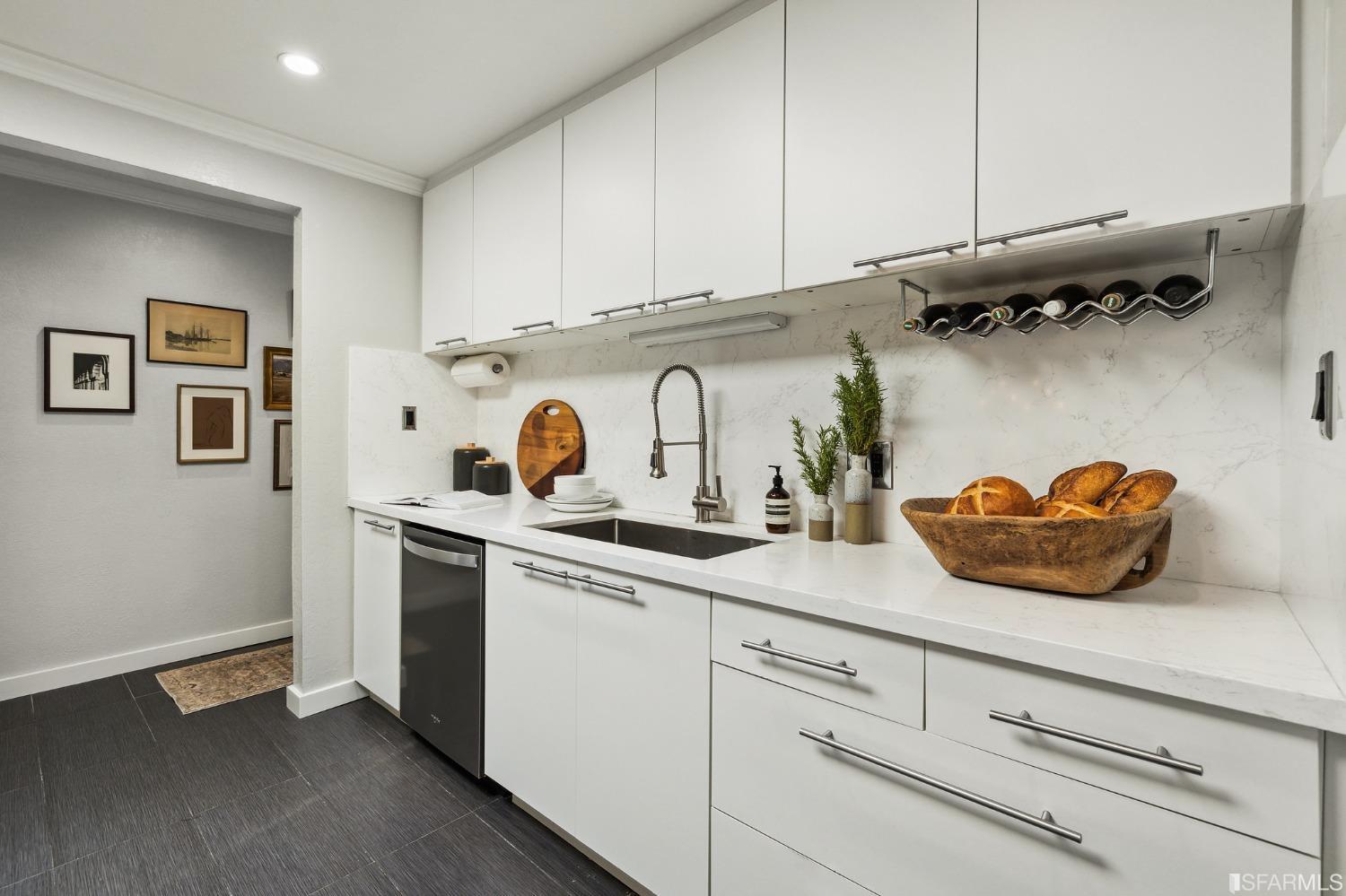 1615 Linda Mar Boulevard Pacifica, CA 94044 - Photo 20 of 41 a kitchen with a sink and cabinets