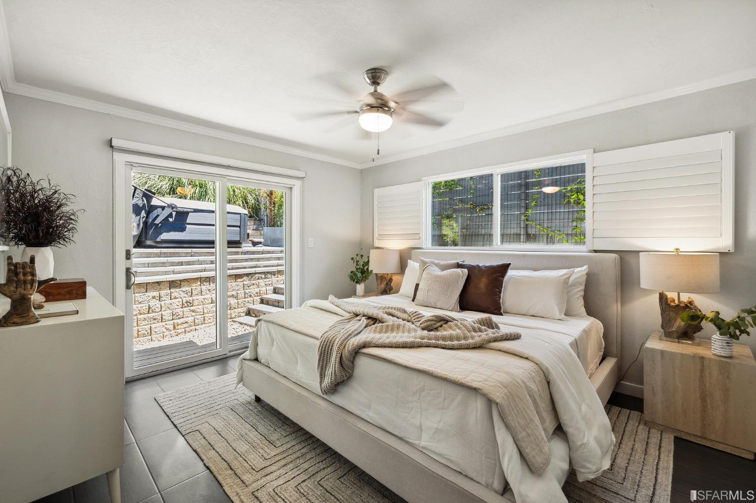 1615 Linda Mar Boulevard Pacifica, CA 94044 - Photo 22 of 41 a bedroom with a bed and a window
