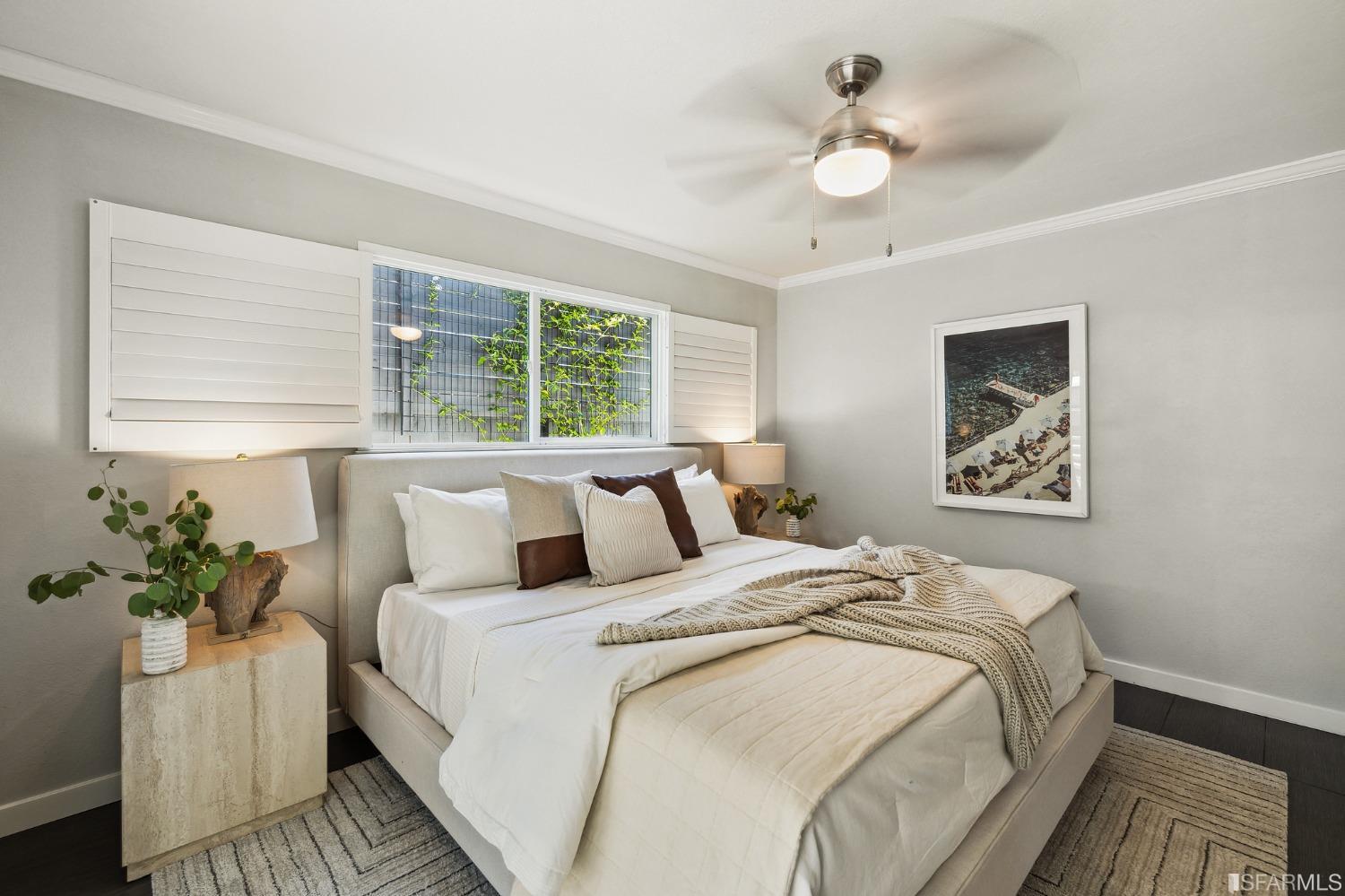 1615 Linda Mar Boulevard Pacifica, CA 94044 - Photo 23 of 41 a bedroom with bed and a potted plant