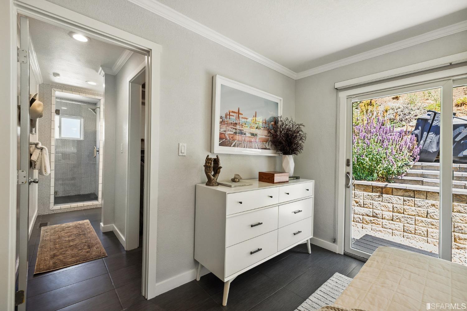 1615 Linda Mar Boulevard Pacifica, CA 94044 - Photo 24 of 41 a room with a bed and a dresser
