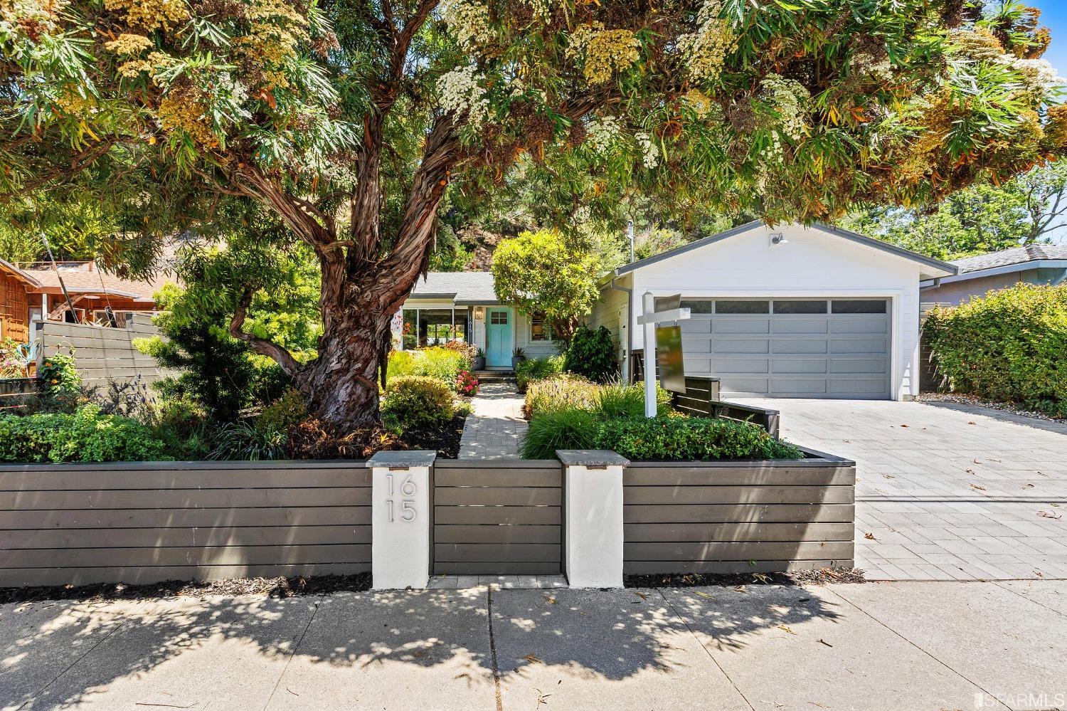 1615 Linda Mar Boulevard Pacifica, CA 94044 - Photo 3 of 41 a front view of a house with a yard