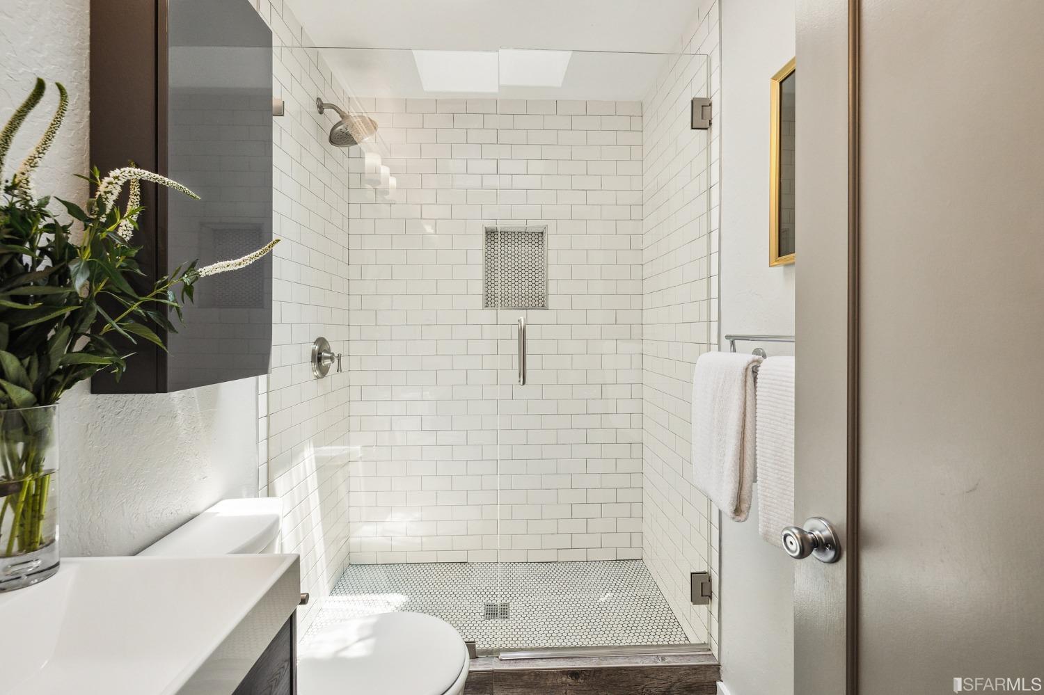 1615 Linda Mar Boulevard Pacifica, CA 94044 - Photo 34 of 41 a bathroom with a shower and a toilet