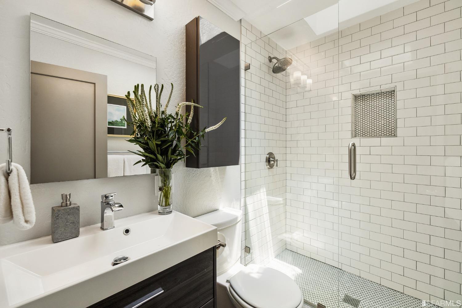 1615 Linda Mar Boulevard Pacifica, CA 94044 - Photo 35 of 41 a bathroom with a sink toilet and shower