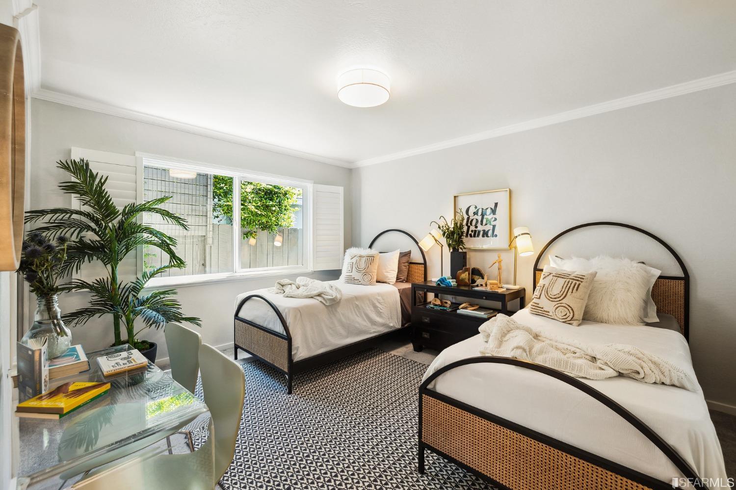 1615 Linda Mar Boulevard Pacifica, CA 94044 - Photo 38 of 41 a bedroom with bed and a large window