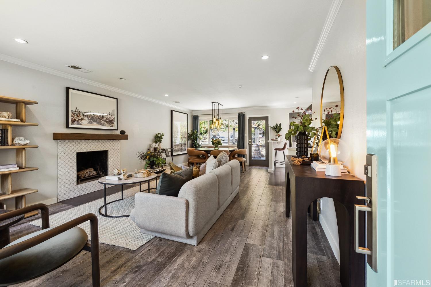 1615 Linda Mar Boulevard Pacifica, CA 94044 - Photo 4 of 41 a living room with furniture fireplace and painting on the wall