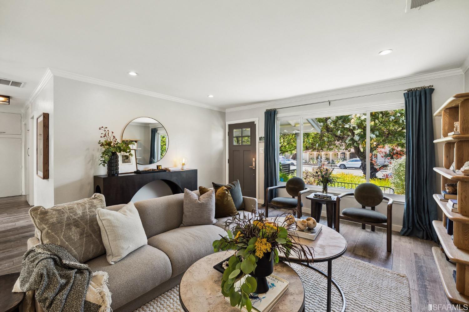 1615 Linda Mar Boulevard Pacifica, CA 94044 - Photo 5 of 41 a living room with furniture and a flat screen tv