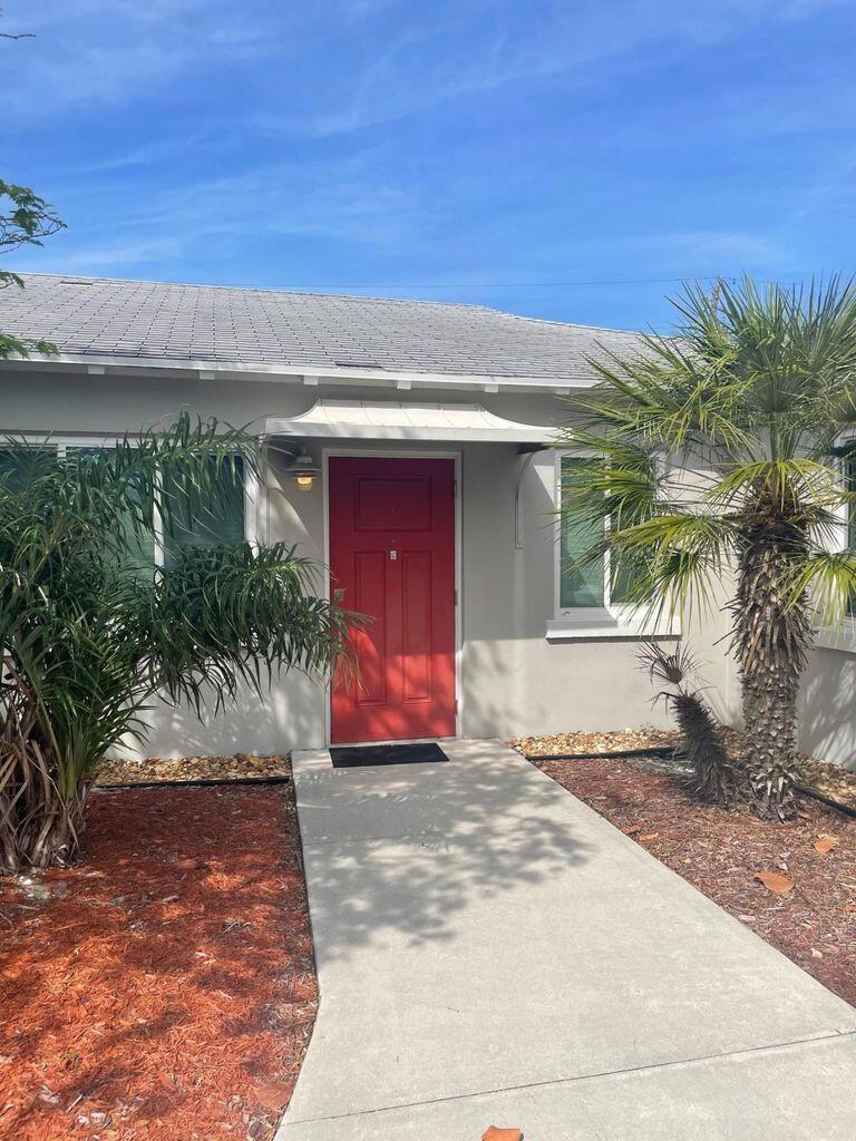 1176 Cabana Road Singer Island, FL 33404 - Photo 13 of 16 entrance door
