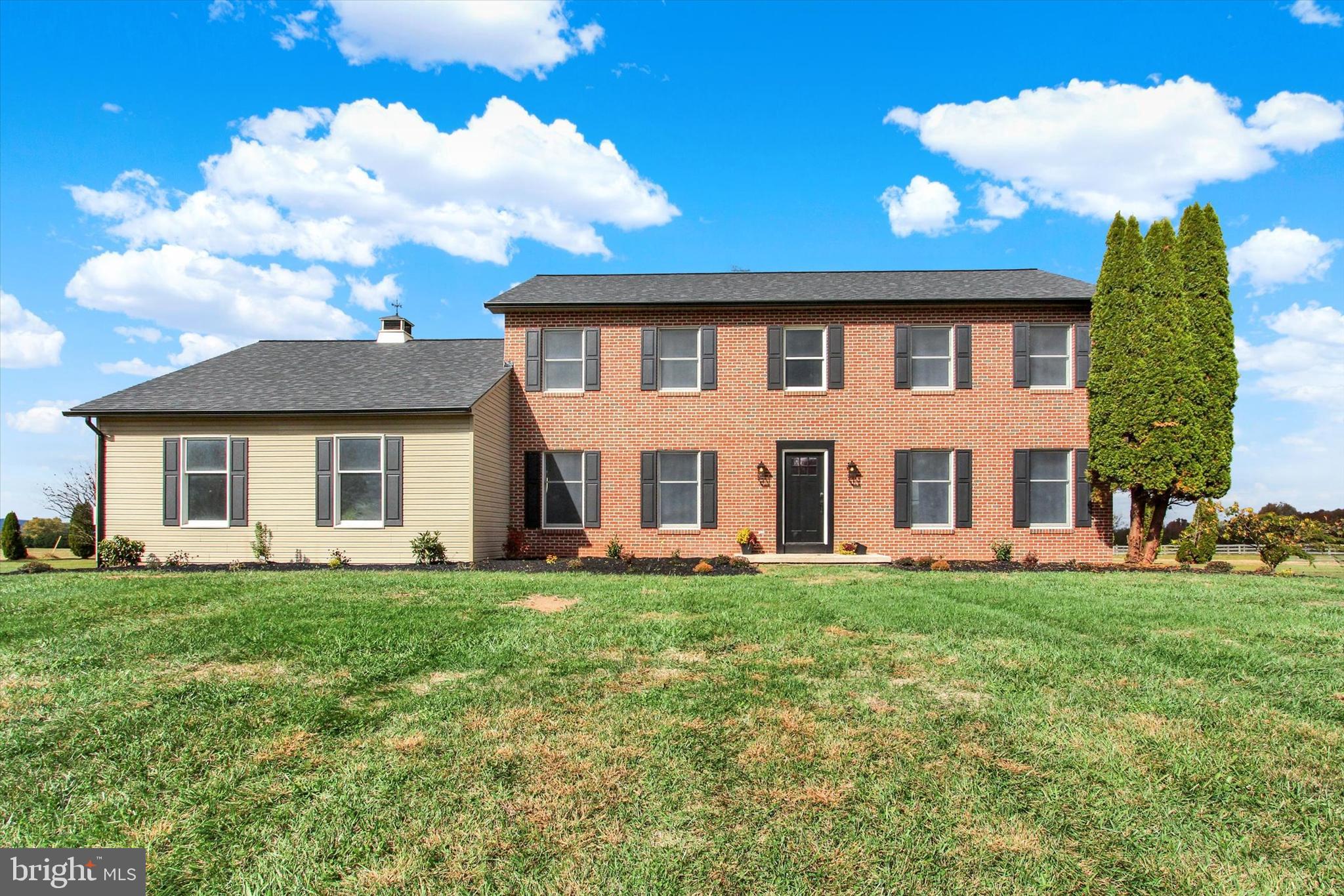 30 Harney Road Littlestown, PA 17340 - Photo 1 of 45 a front view of a house with a garden