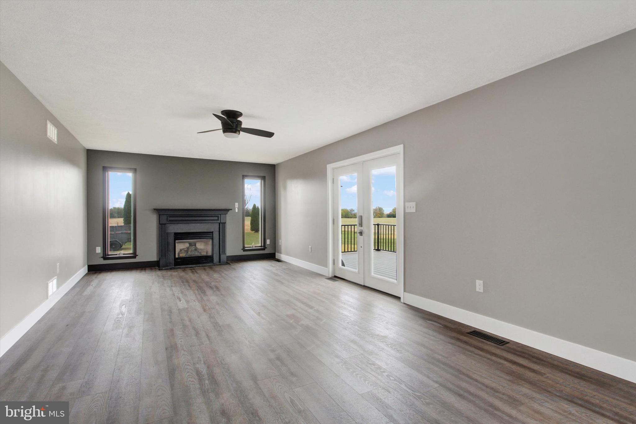 30 Harney Road Littlestown, PA 17340 - Photo 11 of 45 wooden floor in an empty room with a window