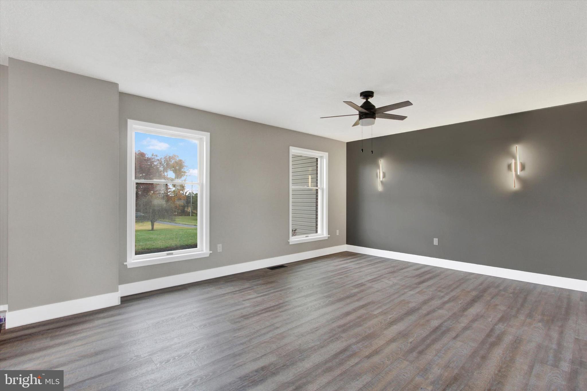 30 Harney Road Littlestown, PA 17340 - Photo 14 of 45 a view of an empty room with wooden floor and a window