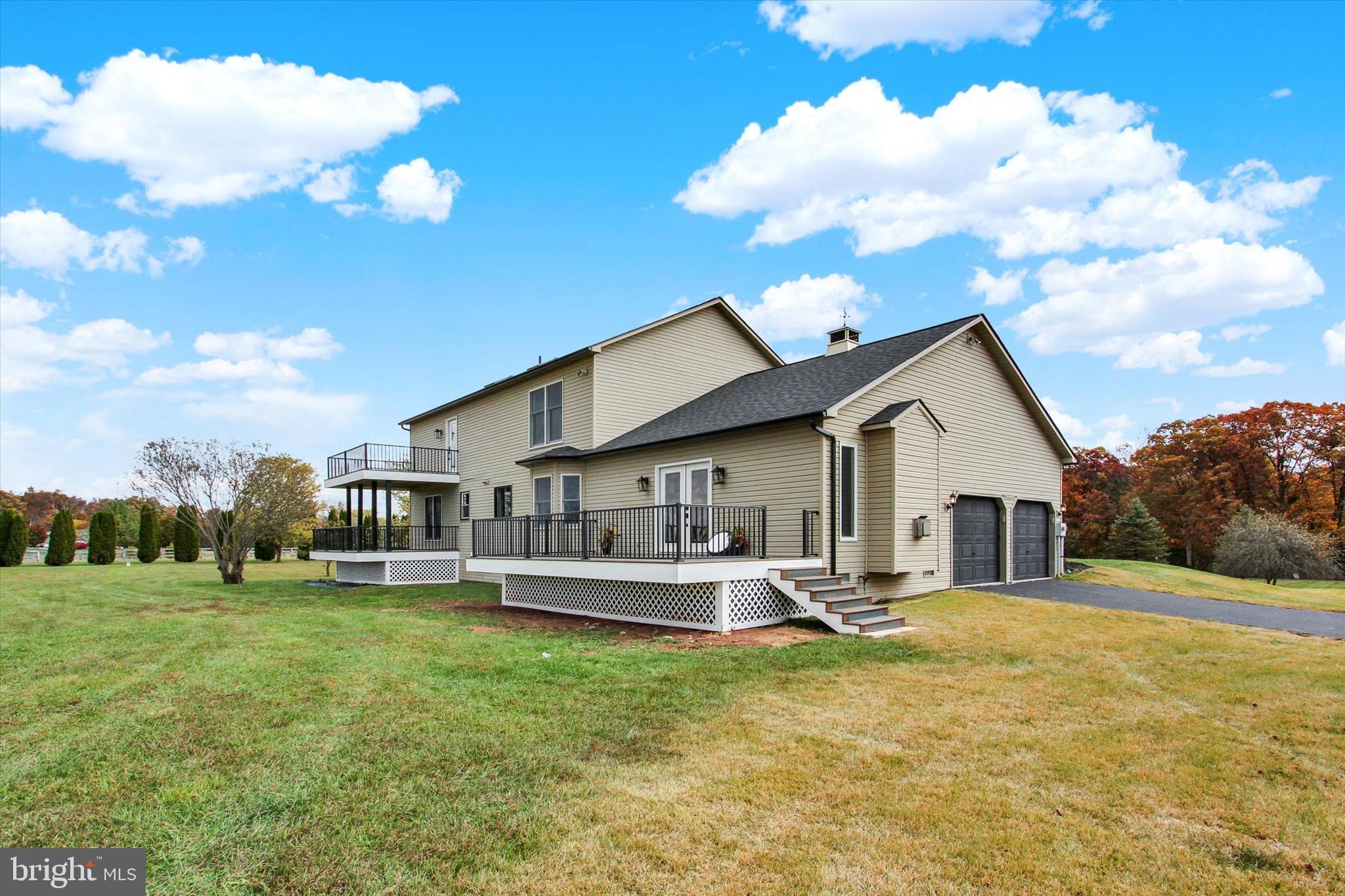 30 Harney Road Littlestown, PA 17340 - Photo 33 of 45 a view of a house with a backyard porch and sitting area