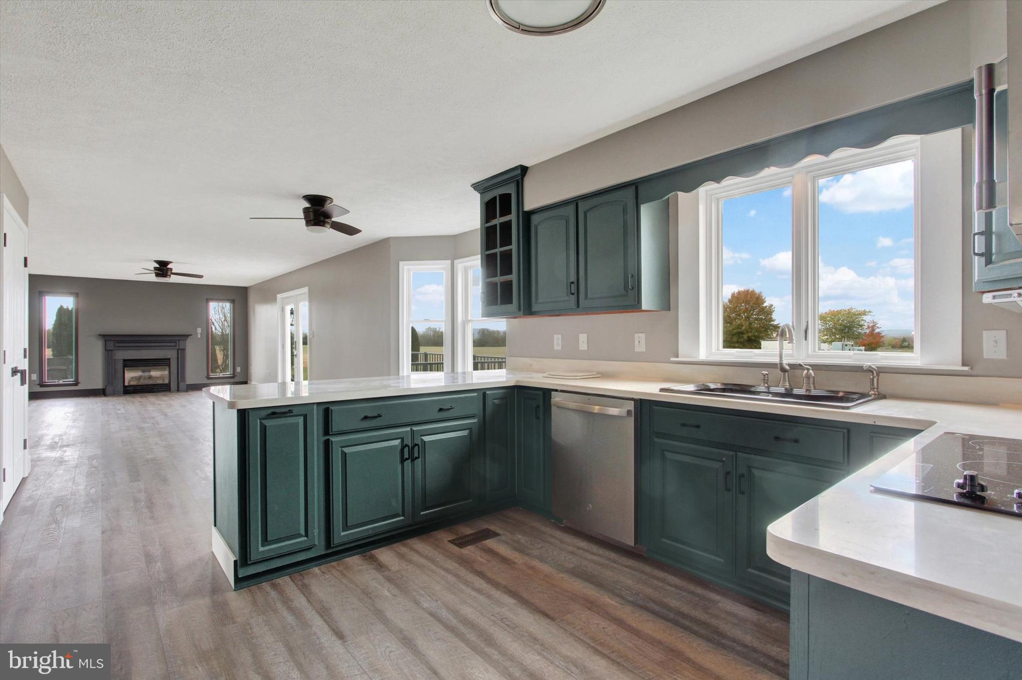 30 Harney Road Littlestown, PA 17340 - Photo 6 of 45 a kitchen with a sink cabinets and wooden floor