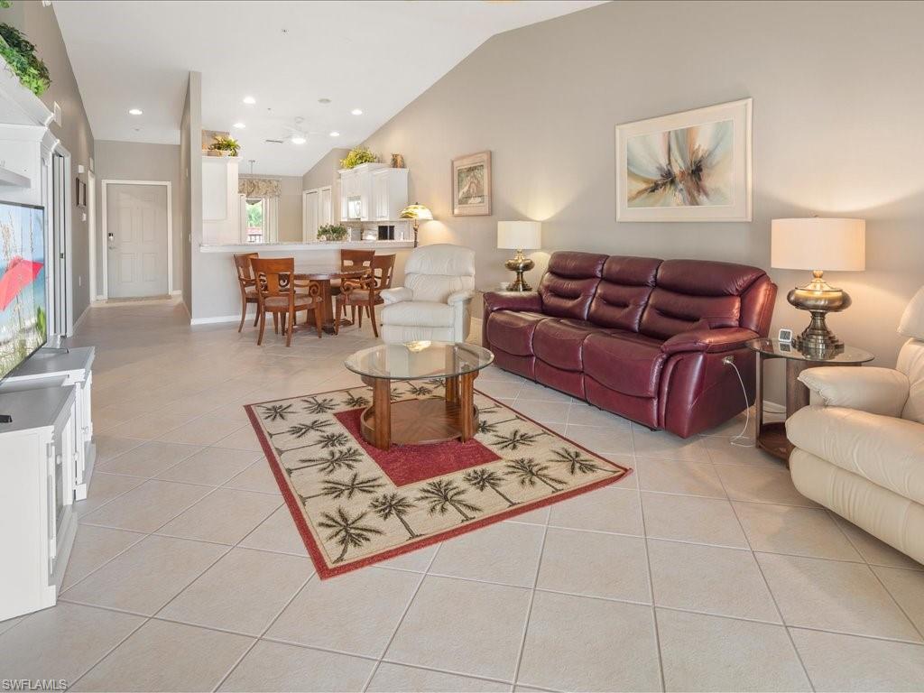 2810 Cypress Trace Circle, Unit 2127 Naples, FL 34119 - Photo 14 of 28 a living room with furniture