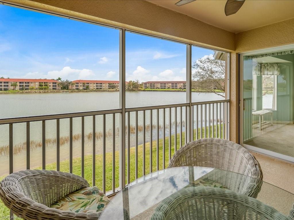 2810 Cypress Trace Circle, Unit 2127 Naples, FL 34119 - Photo 24 of 28 a balcony view with a couch