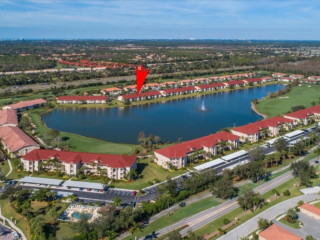 2810 Cypress Trace Circle, Unit 2127 Naples, FL 34119 - Photo 27 of 28 a view of a city with an ocean