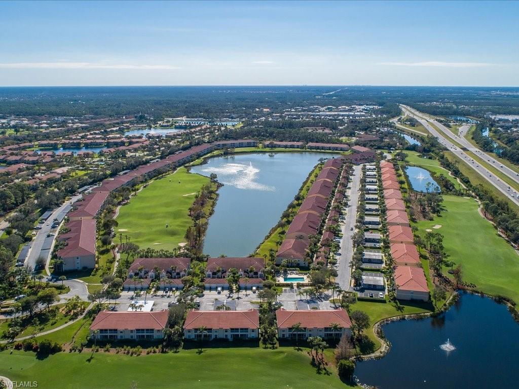2810 Cypress Trace Circle, Unit 2127 Naples, FL 34119 - Photo 28 of 28 an aerial view of a city