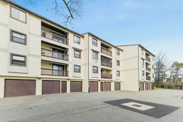 a front view of a building with a street