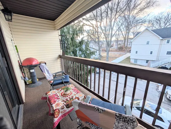 a view of a porch with furniture