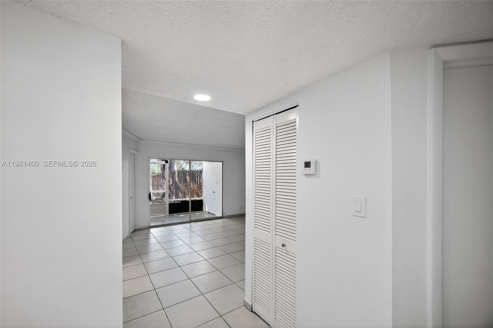 9436 Southwest 140th Court, Unit 9436 Miami, FL 33186 - Photo 15 of 40 a view of a hallway
