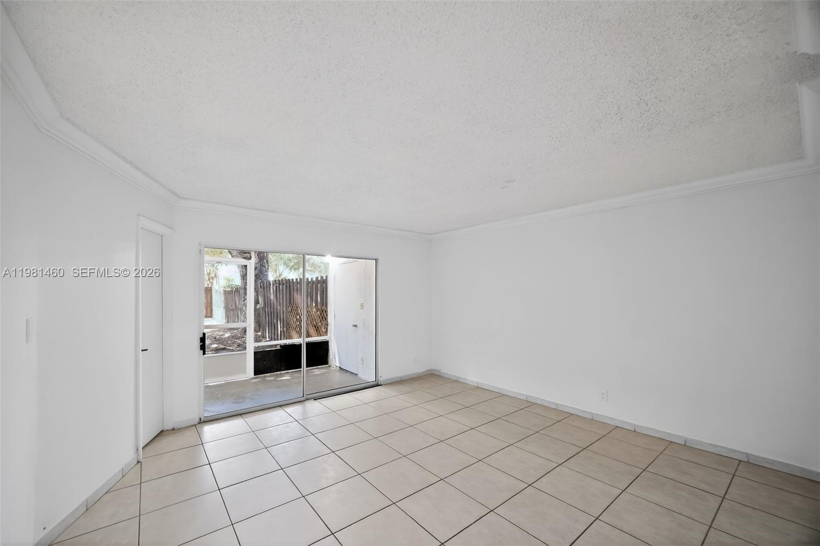 9436 Southwest 140th Court, Unit 9436 Miami, FL 33186 - Photo 18 of 40 a view of empty room with wooden floor