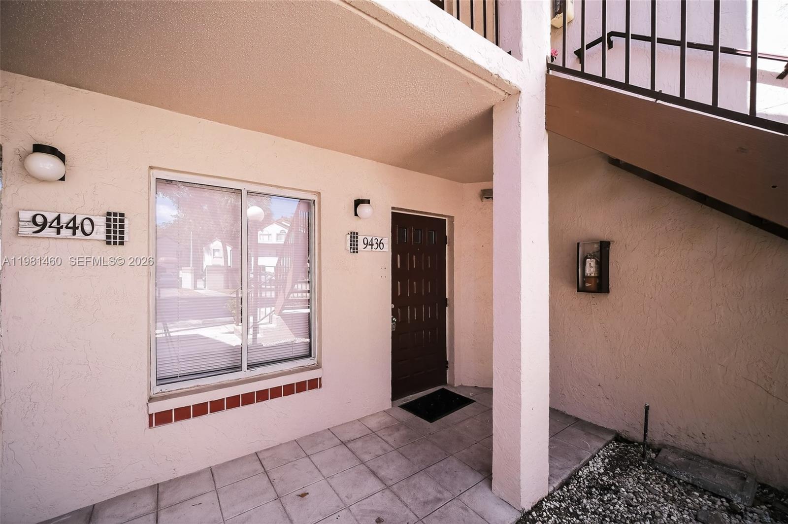 9436 Southwest 140th Court, Unit 9436 Miami, FL 33186 - Photo 2 of 40 a view of an empty room