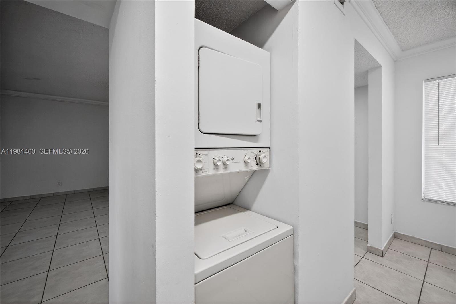 9436 Southwest 140th Court, Unit 9436 Miami, FL 33186 - Photo 28 of 40 a view of washer and dryer