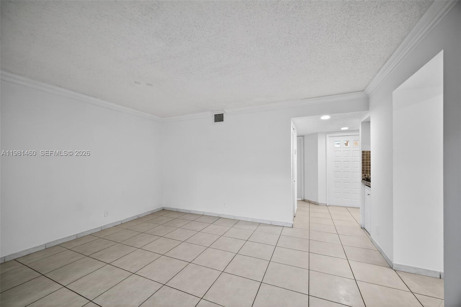 9436 Southwest 140th Court, Unit 9436 Miami, FL 33186 - Photo 6 of 40 a view of an empty room